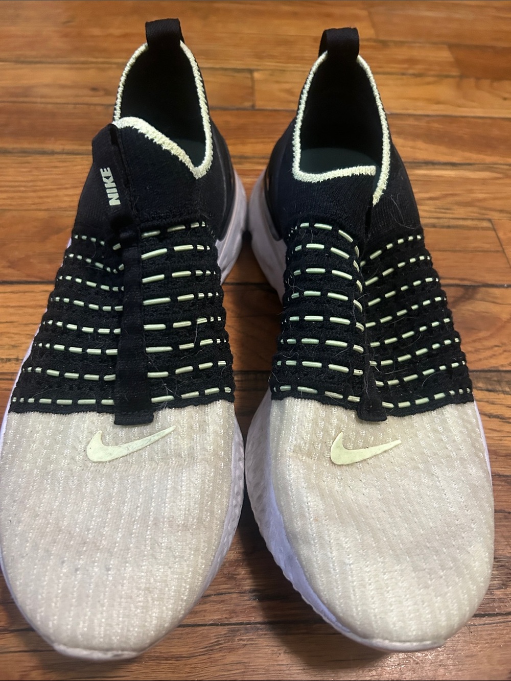 Nike Slip-On Sneakers in Black and Cream with Light Green Accents